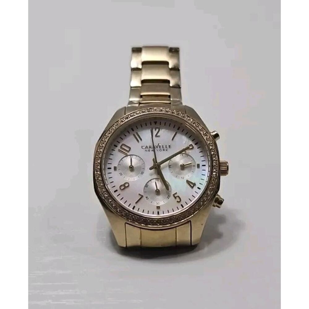 Caravelle New York Ladies Gold Watch by Bulova 44L114 Quartz Pearl Face W4